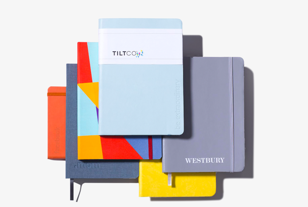 Set of colourful custom branded notebooks